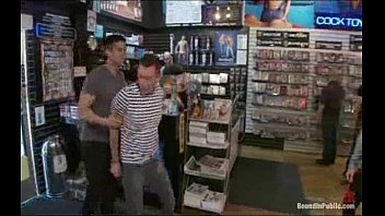 My ass dragged and gang banged in a porn shop