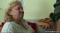Busty granny tastes yummy cock