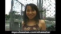 Amateur Asian babe gets nude in public