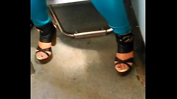 2 - beautiful subway girl in sneakers exhibiting super cleavage