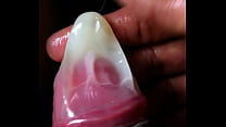 Cumshot inside a condom