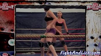 Muscular lesbians wrestling in the boxing ring