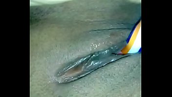 Charapita masturbating with brush