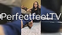 Delicious ebony girl exposing her caramel feet with long blue toe nails