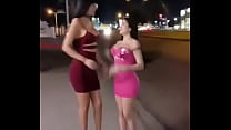 Two whores get naked in public
