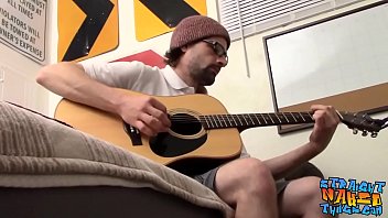 Straight man plays the guitar before playing with his cock