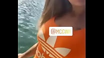 Helen Pales Rolling Up in an Orange Swimsuit