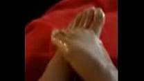 Sexy oiled ebony toes