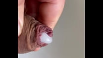 Close up cockhead cumshot