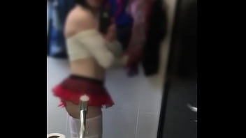 dressing up as a woman in the bathroom of the guy's