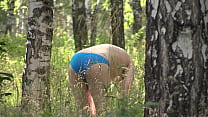 Voyeur watches a milf in early pregnancy outdoors as she walks in the woods and undresses Amateur peeping fetish