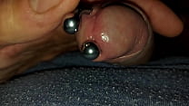 Playing with pierced cock