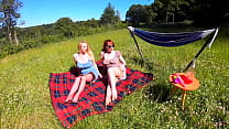 Red XXX and Lucy Gresty enjoy a picnic outdoors