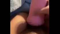 A boy squeezes his penis and ejaculates in the hole