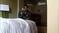 Fat Christine K. nude after taking a shower in the resort room in Florida