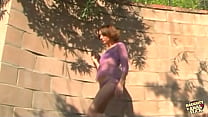 Slutty brunette lets the two men spank her body relentlessly and pound her ass outdoors