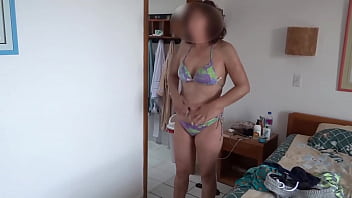 I wear a bikini to go to the beach while stepson films me and masturbates
